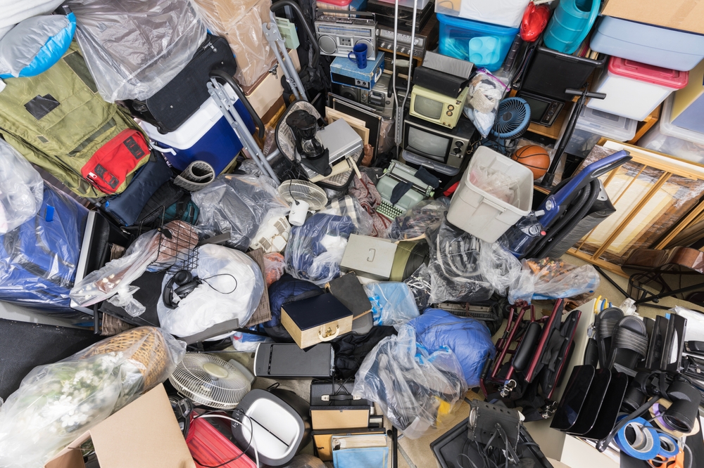 Helping a Loved One With Hoarding: When to Call a Professional Clean-Out Team